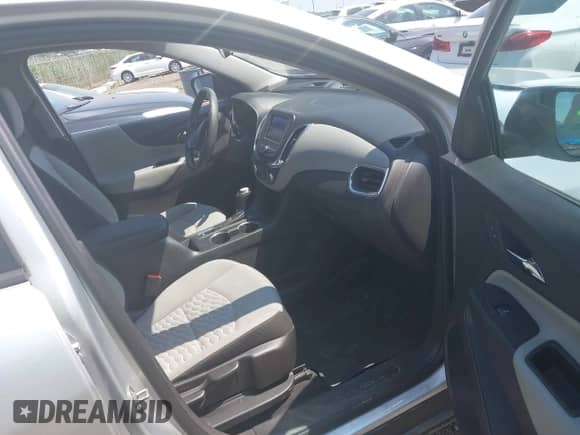 2020 Chevrolet Equinox LS z VIN 3GNAXHEV5LS530276, wystawiony jako IAAI lot #43007341 z przebiegiem 118 029 mil mil oraz . Historia ofert i sprzedaży dostępna na DreamBid. Obrazek 5.
