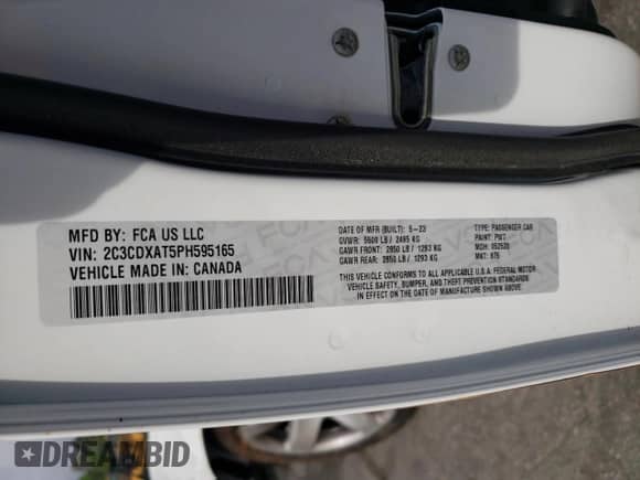 2023 Dodge Charger Police z VIN 2C3CDXAT5PH595165, wystawiony jako Copart lot #51896575 z przebiegiem 6 490 mil mil oraz Szkoda całkowita • Salvage title. Historia ofert i sprzedaży dostępna na DreamBid. Obrazek 12.