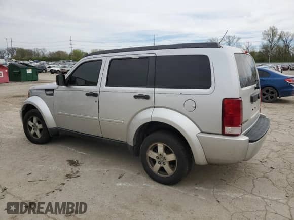 2008 Dodge Nitro SXT с VIN 1D8GU28K68W104944, выставлен на аукционе Copart как лот 51437924 с пробегом Не указан миль и На запчасти • Non repairable. История ставок и продаж доступна на DreamBid. Изображение 2.
