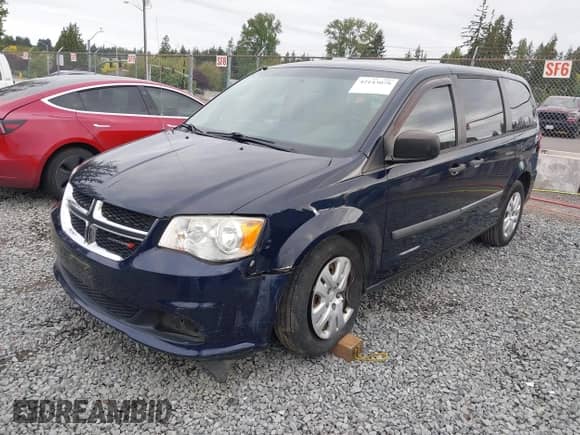 2014 Dodge Grand Caravan SE with VIN 2C4RDGBG0ER187249, listed as a IAAI auction lot 42143078 with 119,097 mi miles and . Bid and sale history available at DreamBid. Image 18.