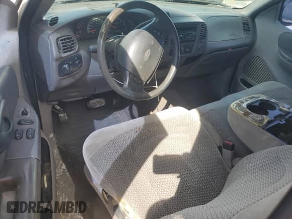 2000 Ford F-150 XL z VIN 1FTZF1721YNB31343, wystawiony jako Copart lot #86056735 z przebiegiem 227 099 mil mil oraz Szkoda całkowita • Salvage title. Historia ofert i sprzedaży dostępna na DreamBid. Obrazek 8.