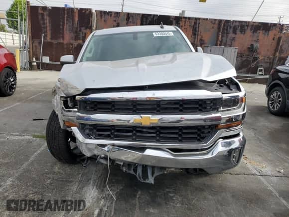 2017 Chevrolet Silverado 1500 LT с VIN 1GCVKREC6HZ147132, выставлен на аукционе Copart как лот 63300645 с пробегом 112 909 миль миль и Списание • Salvage title. История ставок и продаж доступна на DreamBid. Изображение 5.