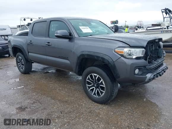 2021 Toyota Tacoma SR5 с VIN 5TFAZ5CNXMX097509, выставлен на аукционе IAAI как лот 41889399 с пробегом 81 598 миль миль и . История ставок и продаж доступна на DreamBid. Изображение 1.