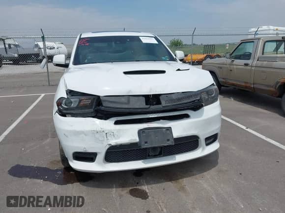 2018 Dodge Durango SRT with VIN 1C4SDJGJ2JC434843, listed as a IAAI auction lot 42434327 with 144,483 mi miles and . Bid and sale history available at DreamBid. Image 6.