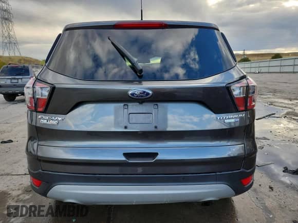2017 Ford Escape Titanium с VIN 1FMCU9JD4HUD11289, выставлен на аукционе Copart как лот 85590715 с пробегом 78 983 миль миль и Списание • Salvage title. История ставок и продаж доступна на DreamBid. Изображение 6.