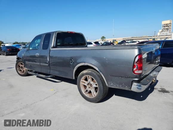 2003 Ford F-150 XL with VIN 1FTRX17WX3NA57042, listed as a Copart auction lot 82408565 with Not provided miles and Clean title. Bid and sale history available at DreamBid. Image 2.