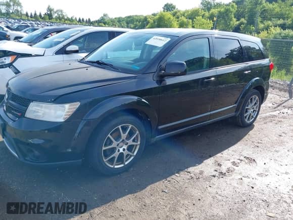 2012 Dodge Journey R/T with VIN 3C4PDDEG7CT342410, listed as a IAAI auction lot 42690612 with 138,951 mi miles and . Bid and sale history available at DreamBid. Image 2.