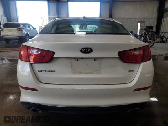 2015 Kia Optima LX with VIN KNAGM4A75F5557212, listed as a Copart auction lot 86437945 with 114,534 mi miles and Salvage title. Bid and sale history available at DreamBid. Image 6.