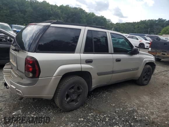 2004 Chevrolet TrailBlazer LT with VIN 1GNDS13S342302480, listed as a Copart auction lot 64365275 with 263,074 mi miles and Salvage title. Bid and sale history available at DreamBid. Image 3.
