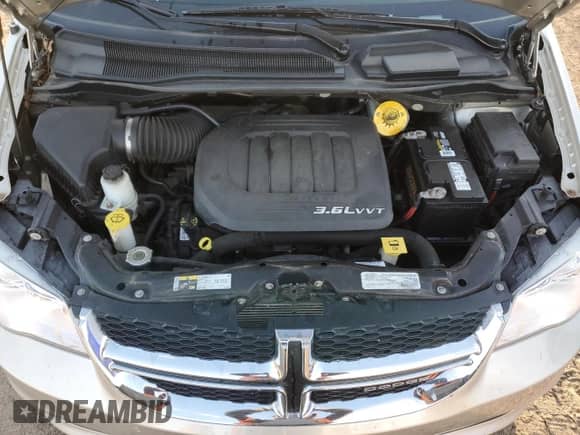 2015 Dodge Grand Caravan SXT z VIN 2C4RDGCG8FR724563, wystawiony jako Copart lot #84570355 z przebiegiem 81 587 mil mil oraz Szkoda całkowita • Salvage title. Historia ofert i sprzedaży dostępna na DreamBid. Obrazek 12.