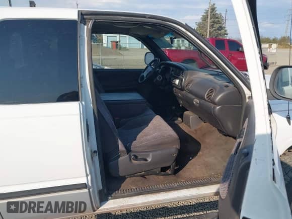 1999 Dodge 1500 with VIN 1B7HF13Z0XJ615587, listed as a IAAI auction lot 43057514 with 209,162 mi miles and . Bid and sale history available at DreamBid. Image 5.