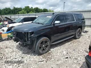2017 Chevrolet Suburban Premier with VIN 1GNSKJKC7HR140805, listed as a Copart auction lot 65081765 with 118,226 mi miles and Salvage title. Bid and sale history available at DreamBid. Image 1.