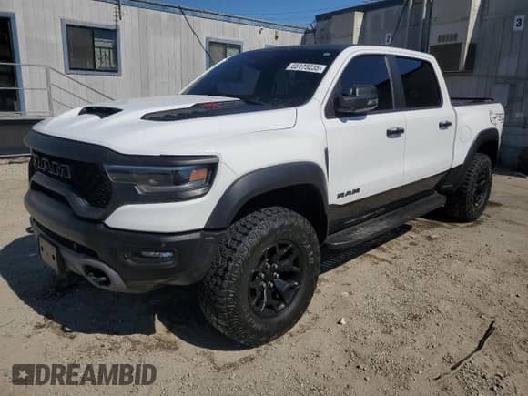 2023 Ram 1500 TRX z VIN 1C6SRFU94PN509541, wystawiony jako Copart lot #65175235 z przebiegiem 25 593 mil mil oraz Czysty tytuł • Clean title. Historia ofert i sprzedaży dostępna na DreamBid. Obrazek 1.