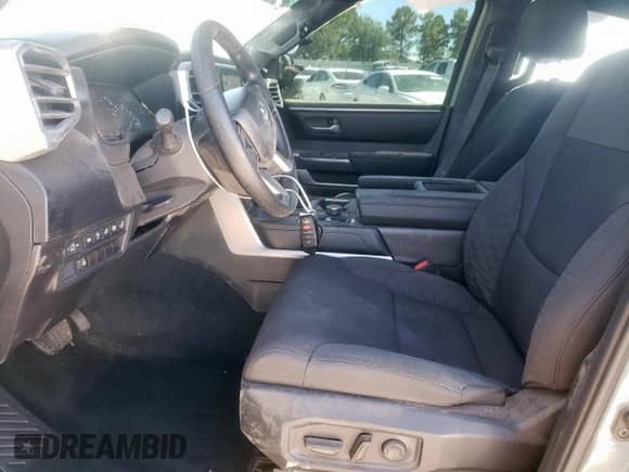 2025 Toyota Tundra SR with VIN 5TFLA5DB4SX257935, listed as a Copart auction lot 57320765 with 6,384 mi miles and Salvage title. Bid and sale history available at DreamBid. Image 7.