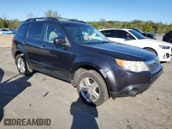 2009 Subaru Forester X with VIN JF2SH63649H725153, listed as a Copart auction lot 82190825 with 207,429 mi miles and Salvage title. Bid and sale history available at DreamBid. Image 4.