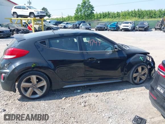 2013 Hyundai Veloster Turbo с VIN KMHTC6AE5DU174142, выставлен на аукционе IAAI как лот 42424749 с пробегом 69 744 миль миль и . История ставок и продаж доступна на DreamBid. Изображение 13.