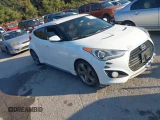 2014 Hyundai Veloster Turbo с VIN KMHTC6AE1EU192591, выставлен на аукционе IAAI как лот 43443000 с пробегом 125 556 миль миль и . История ставок и продаж доступна на DreamBid. Изображение 1.