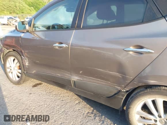 2013 Hyundai Tucson Limited с VIN KM8JU3AC8DU554268, выставлен на аукционе IAAI как лот 41977168 с пробегом 137 573 миль миль и . История ставок и продаж доступна на DreamBid. Изображение 6.