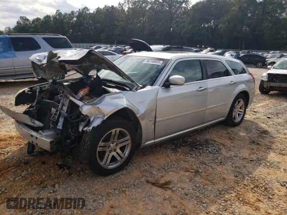 2006 Dodge Magnum with VIN 2D4FV47V76H124195, listed as a Copart auction lot 48734725 with 196,437 mi miles and Salvage title. Bid and sale history available at DreamBid. Image 1.