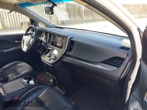 2016 Toyota Sienna SE with VIN 5TDXK3DCXGS700517, listed as a IAAI auction lot 40573738 with 141,785 mi miles and . Bid and sale history available at DreamBid. Image 5.