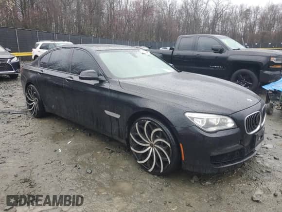 2013 BMW 7 Series 750i xDrive with VIN WBAYB6C58DD223681, listed as a Copart auction lot 50156875 with 139,422 mi miles and Salvage title. Bid and sale history available at DreamBid. Image 4.
