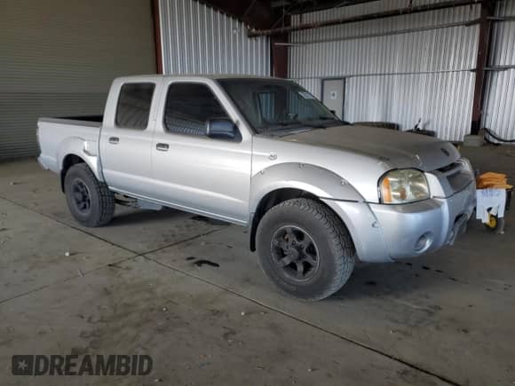 2004 Nissan Frontier XE with VIN 1N6ED27T04C482766, listed as a Copart auction lot 70511715 with 190,265 mi miles and Clean title. Bid and sale history available at DreamBid. Image 4.