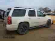 2014 Chevrolet Tahoe LTZ с VIN 1GNSCCE02ER114523, выставлен на аукционе Copart как лот 44106855 с пробегом 198 011 миль миль и Списание • Salvage title. История ставок и продаж доступна на DreamBid. Изображение 3.