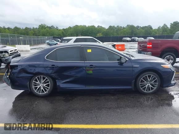 2021 Toyota Camry Hybrid XLE with VIN 4T1F31AK4MU546558, listed as a IAAI auction lot 42235763 with 62,299 mi miles and . Bid and sale history available at DreamBid. Image 13.