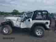 2004 Jeep Wrangler Sport z VIN 1J4FA49S34P802200, wystawiony jako IAAI lot #42706823 z przebiegiem Nie podano mil oraz . Historia ofert i sprzedaży dostępna na DreamBid. Obrazek 13.