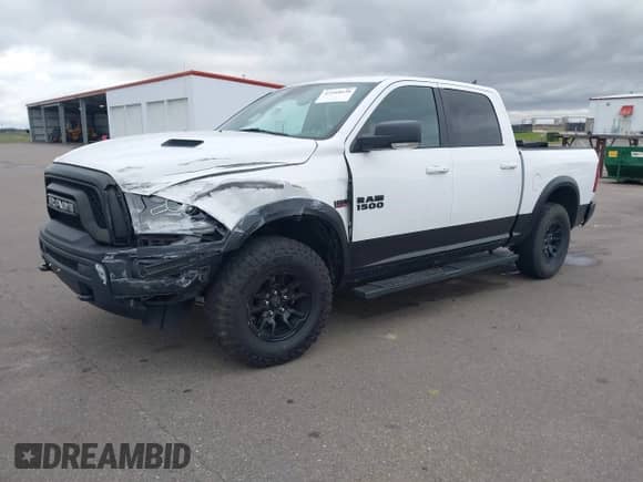 2018 Ram 1500 Rebel with VIN 1C6RR7YT8JS150942, listed as a IAAI auction lot 42168638 with 99,060 mi miles and . Bid and sale history available at DreamBid. Image 2.