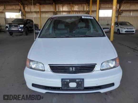 1995 Honda Odyssey EX с VIN JHMRA1875SC015010, выставлен на аукционе Copart как лот 87073144 с пробегом 77 222 миль миль и Списание • Salvage title. История ставок и продаж доступна на DreamBid. Изображение 5.