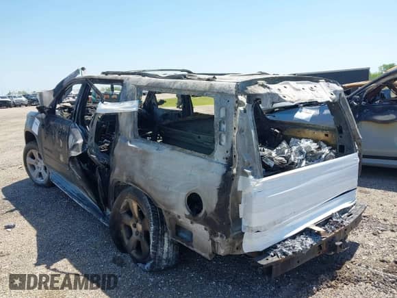 2016 Chevrolet Suburban LTZ with VIN 1GNSCJKCXGR268158, listed as a IAAI auction lot 41988646 with Not provided miles and . Bid and sale history available at DreamBid. Image 3.