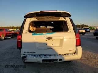 2020 Chevrolet Suburban LT with VIN 1GNSCHKC2LR220477, listed as a Copart auction lot 71464335 with Not provided miles and Salvage title. Bid and sale history available at DreamBid. Image 6.