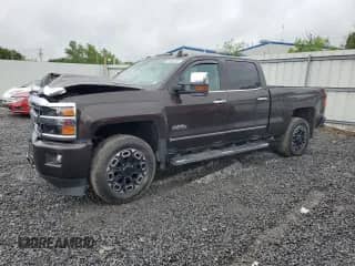 2018 Chevrolet Silverado 2500HD High Country с VIN 1GC1KXEY4JF198831, выставлен на аукционе Copart как лот 60093505 с пробегом Не указан миль и Списание • Salvage title. История ставок и продаж доступна на DreamBid. Изображение 1.