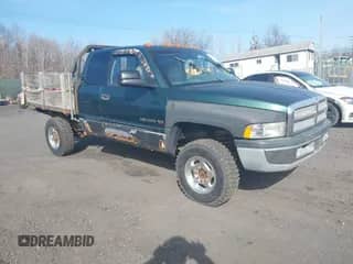 2001 Dodge 2500 with VIN 1B7KF23WX1J517434, listed as a IAAI auction lot 41795459 with 140,148 mi miles and . Bid and sale history available at DreamBid. Image 1.
