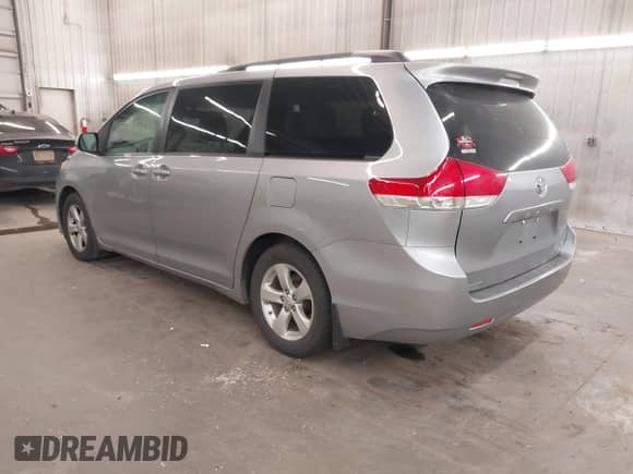 2012 Toyota Sienna LE AAS with VIN 5TDKK3DC2CS265495, listed as a IAAI auction lot 42890699 with 227,296 mi miles and . Bid and sale history available at DreamBid. Image 3.