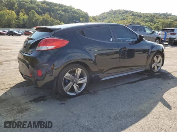 2013 Hyundai Veloster Turbo с VIN KMHTC6AE0DU148225, выставлен на аукционе Copart как лот 80101495 с пробегом 140 047 миль миль и Чистый • Clean title. История ставок и продаж доступна на DreamBid. Изображение 3.