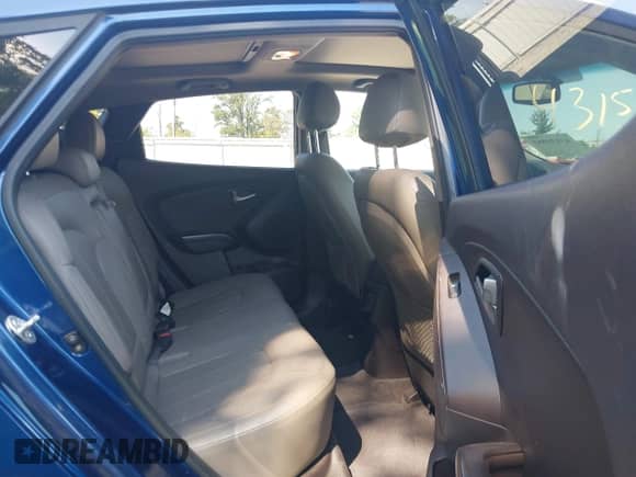 2014 Hyundai Tucson SE with VIN KM8JU3AGXEU804730, listed as a IAAI auction lot 43154883 with 116,472 mi miles and . Bid and sale history available at DreamBid. Image 8.