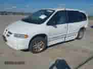 1999 Dodge Caravan SE with VIN 1B4GP44G2XB916067, listed as a IAAI auction lot 43431260 with Not provided miles and . Bid and sale history available at DreamBid. Image 2.