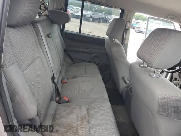 2006 Jeep Commander z VIN 1J8HG48K56C295849, wystawiony jako Copart lot #64956285 z przebiegiem Nie podano mil oraz Szkoda całkowita • Salvage title. Historia ofert i sprzedaży dostępna na DreamBid. Obrazek 10.