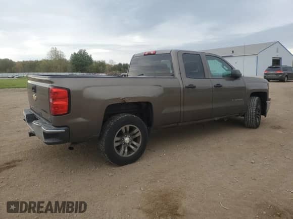 2014 Chevrolet Silverado 1500 LT с VIN 1GCRCREH1EZ145715, выставлен на аукционе Copart как лот 82517325 с пробегом 245 253 миль миль и Списание • Salvage title. История ставок и продаж доступна на DreamBid. Изображение 3.