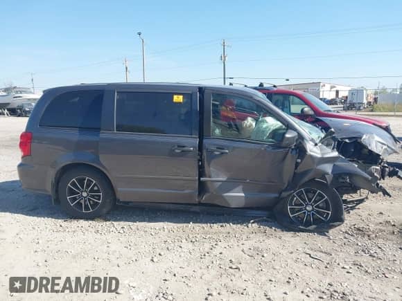 2014 Dodge Grand Caravan SXT with VIN 2C4RDGCG8ER471971, listed as a IAAI auction lot 43349621 with 195,765 mi miles and . Bid and sale history available at DreamBid. Image 12.