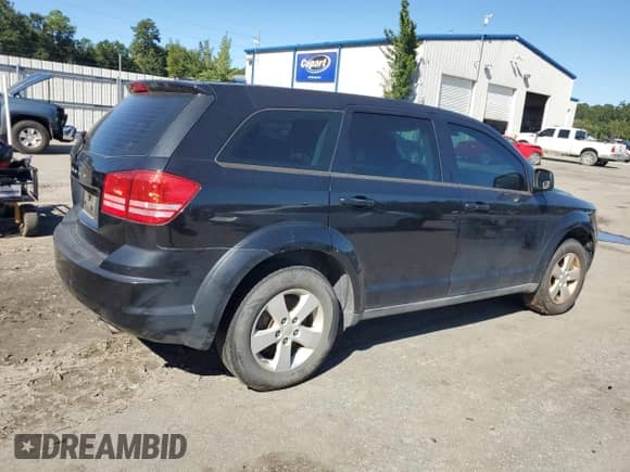 2013 Dodge Journey SE с VIN 3C4PDCAB0DT626998, выставлен на аукционе Copart как лот 82431305 с пробегом 159 124 миль миль и Чистый • Clean title. История ставок и продаж доступна на DreamBid. Изображение 3.