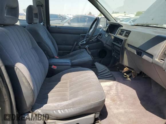 1993 Nissan Frontier with VIN 1N6SD16S1PC439886, listed as a Copart auction lot 71461255 with 205,971 mi miles and Salvage title. Bid and sale history available at DreamBid. Image 7.
