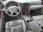 2007 Jeep Grand Cherokee Limited с VIN 1J8HR58247C524863, выставлен на аукционе Copart как лот 64720695 с пробегом Не указан миль и На запчасти • Non repairable. История ставок и продаж доступна на DreamBid. Изображение 8.