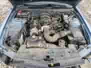 2005 Ford Mustang Deluxe z VIN 1ZVFT80N755259703, wystawiony jako Copart lot #86684285 z przebiegiem 160 486 mil mil oraz Nie do naprawy • Non repairable. Historia ofert i sprzedaży dostępna na DreamBid. Obrazek 11.