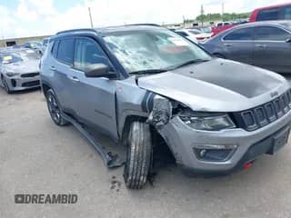 2018 Jeep Compass Trailhawk z VIN 3C4NJDDBXJT441628, wystawiony jako IAAI lot #42603836 z przebiegiem 154 179 mil mil oraz . Historia ofert i sprzedaży dostępna na DreamBid. Obrazek 1.
