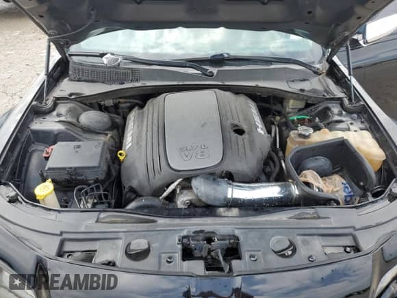 2014 Chrysler 300 C z VIN 2C3CCAET4EH185223, wystawiony jako Copart lot #69456005 z przebiegiem 58 961 mil mil oraz Szkoda całkowita • Salvage title. Historia ofert i sprzedaży dostępna na DreamBid. Obrazek 11.