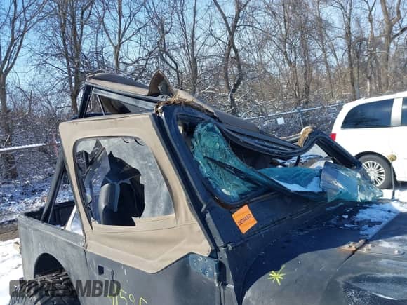 1991 Jeep Wrangler with VIN 2J4FY19P1MJ154813, listed as a IAAI auction lot 41595567 with Not provided miles and . Bid and sale history available at DreamBid. Image 14.