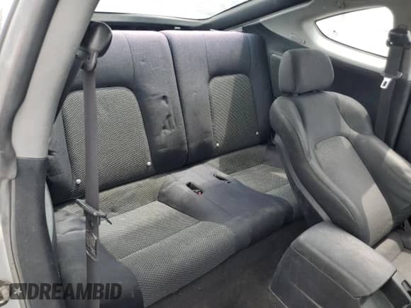 2006 Hyundai Tiburon GS с VIN KMHHM65D86U212227, выставлен на аукционе Copart как лот 59633855 с пробегом Не указан миль и Списание • Salvage title. История ставок и продаж доступна на DreamBid. Изображение 10.